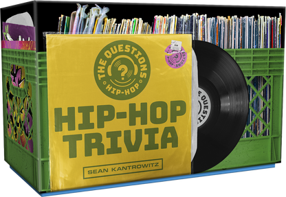 The Questions Hip-Hop Trivia Card Game box, styled as a yellow record sleeve in a green crate beside a vinyl record
